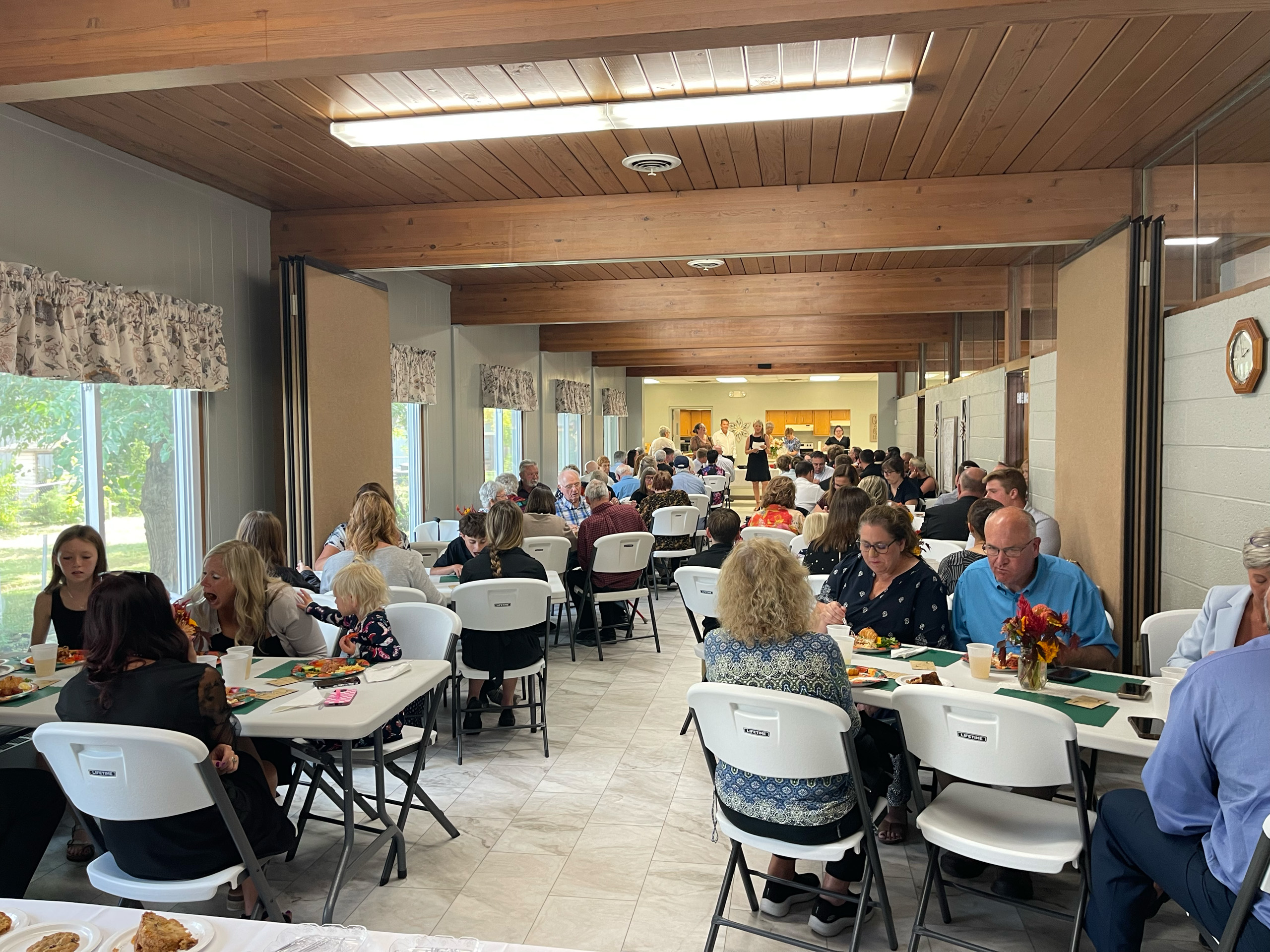 Community dinner in large room at Farmersville United Methodist Church