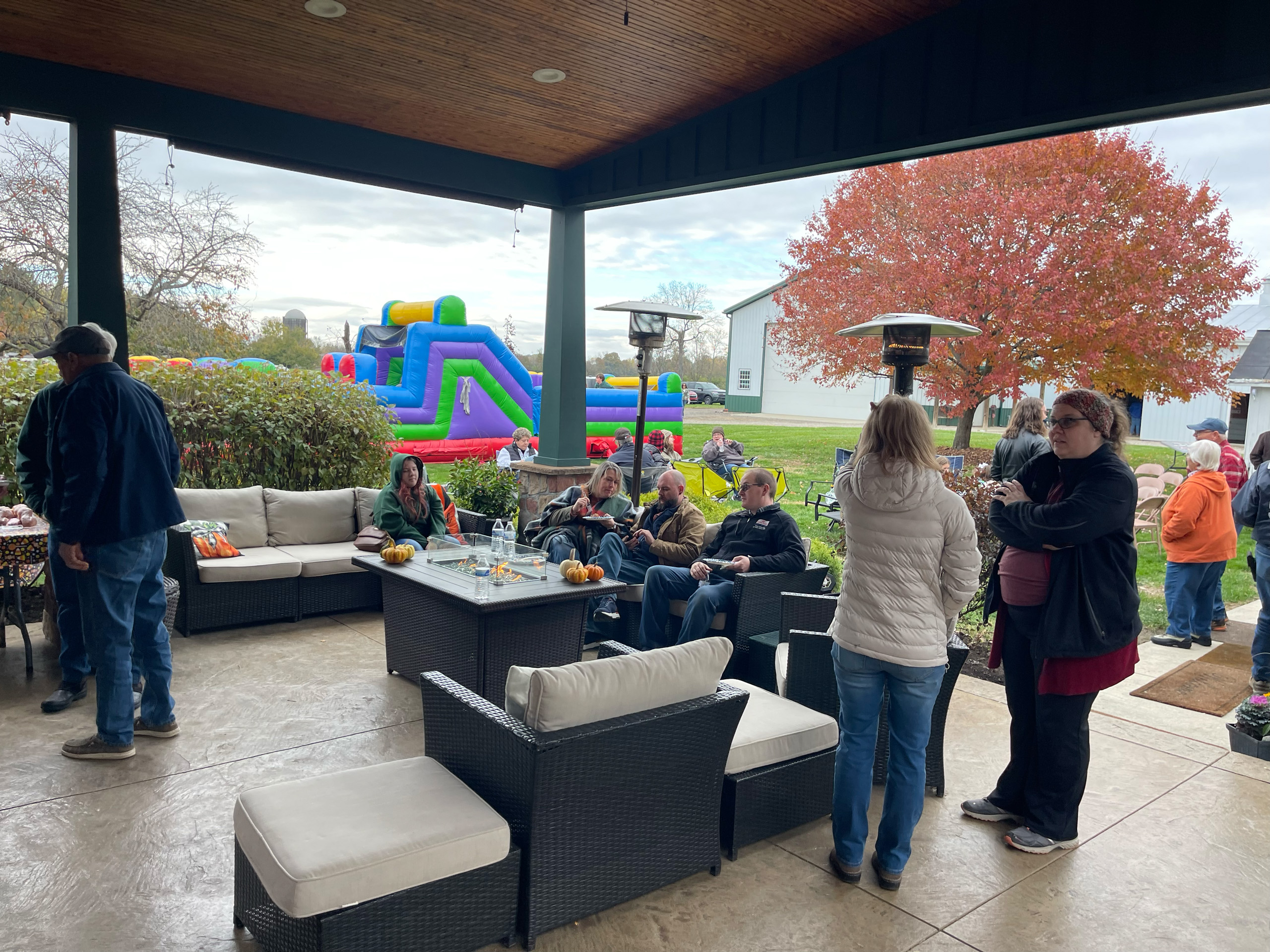 Group of people socializing on an outdoor patio
