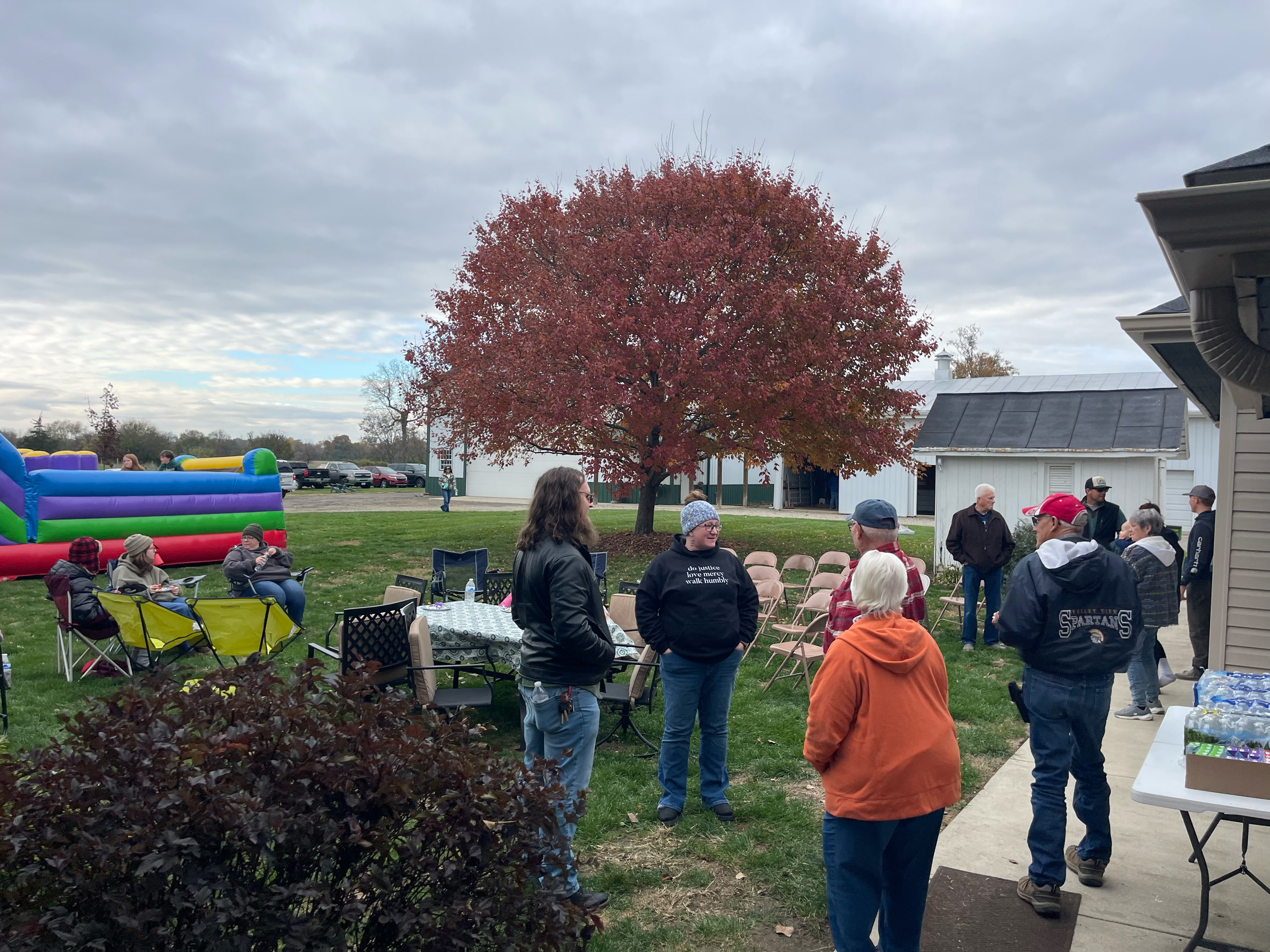 Group of people at a backyard gathering