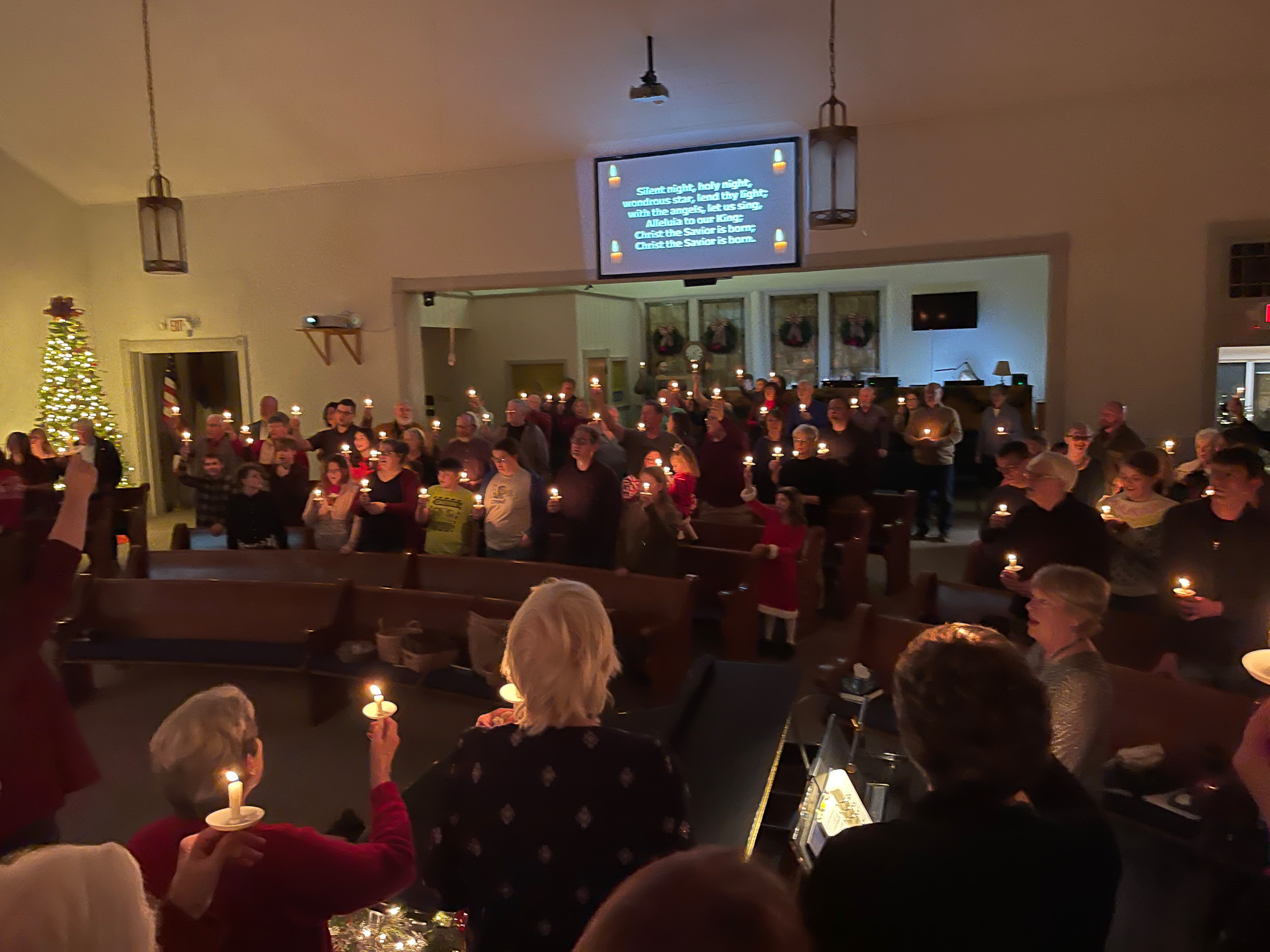 Candlelight holiday event in Farmersville United Methodist Church